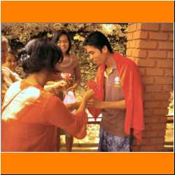 w-receiving-flowers-after-baptism.jpg