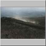 Climbers kicking up dust on trail up Mt. Fuji in Japan