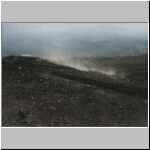 Climbers kicking up dust on trail up Mt. Fuji in Japan