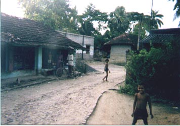 Kids gawking at an alien in India, 1998